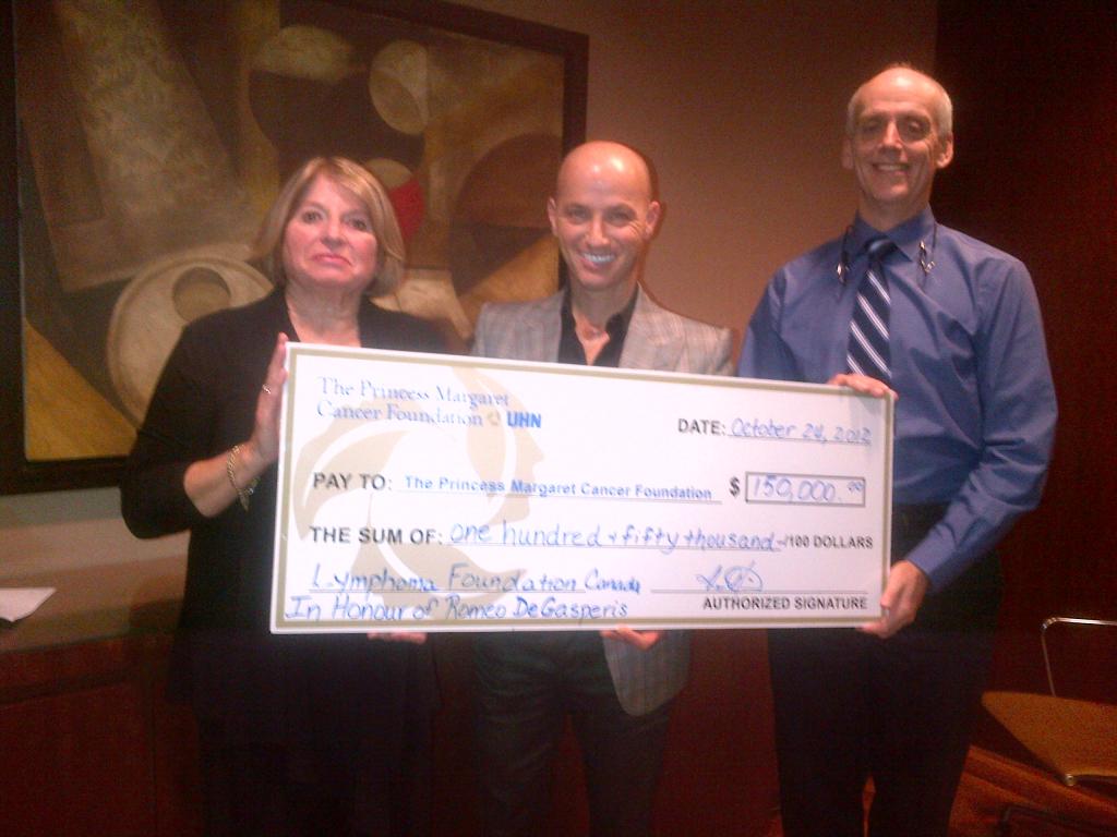 PMH Research Cheque A photo of LC's executive director giving a cheque to Princess Margaret Hospital